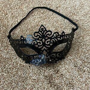 Black plastic filigree masquerade ball mask